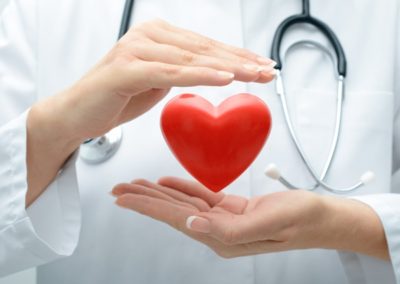 Doctor holding heart
